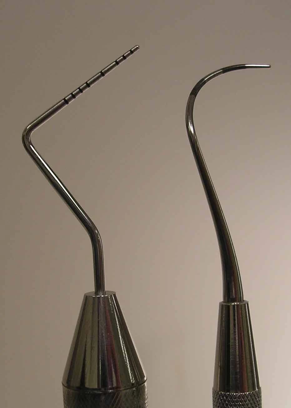 Periodontal instrument comparison — graduated probe at left