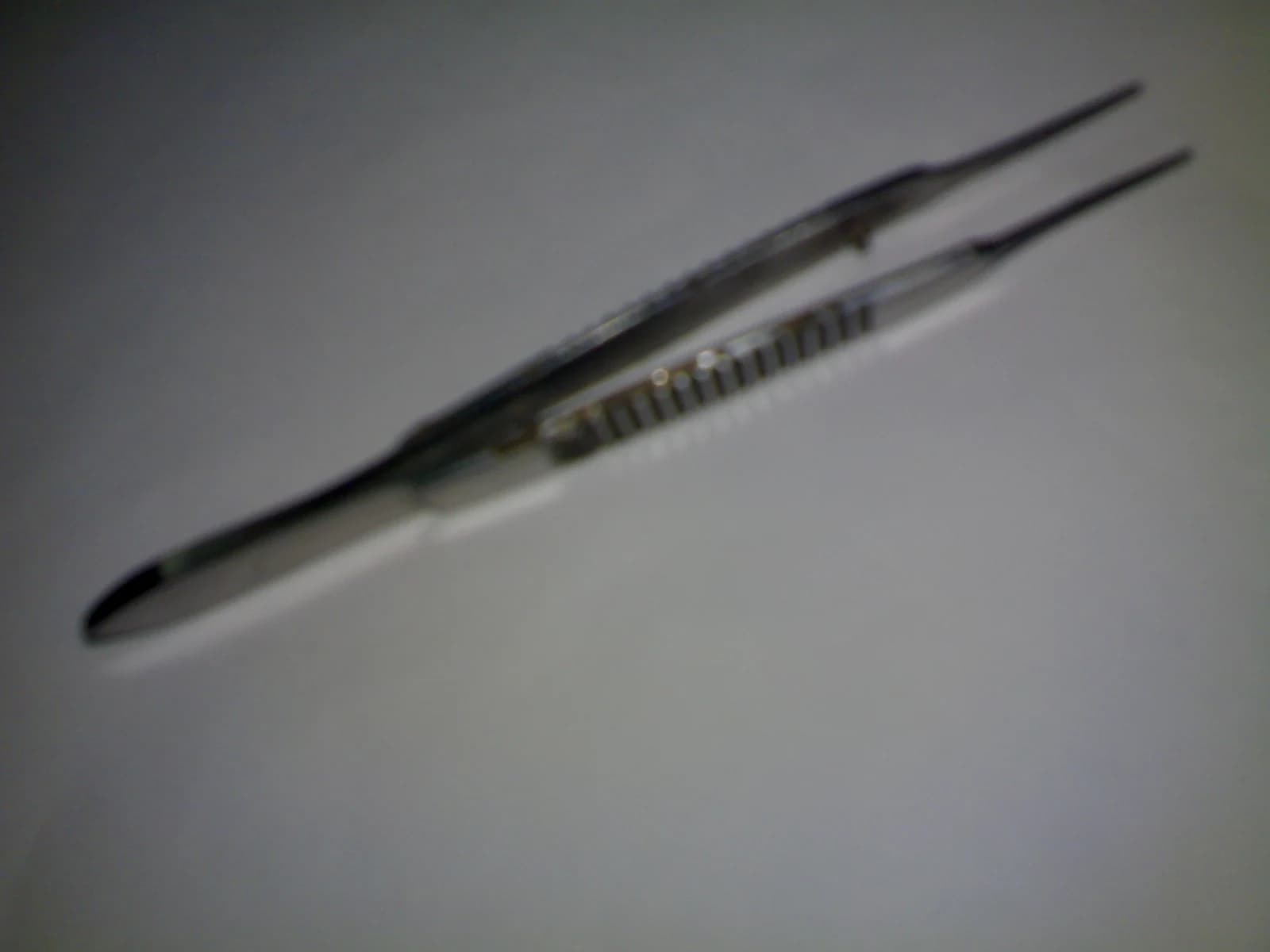 Suture-tying forceps — reference view