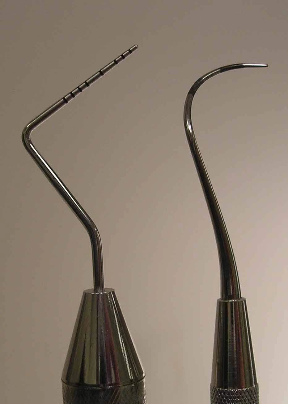 Periodontal instrument comparison — graduated probe at left