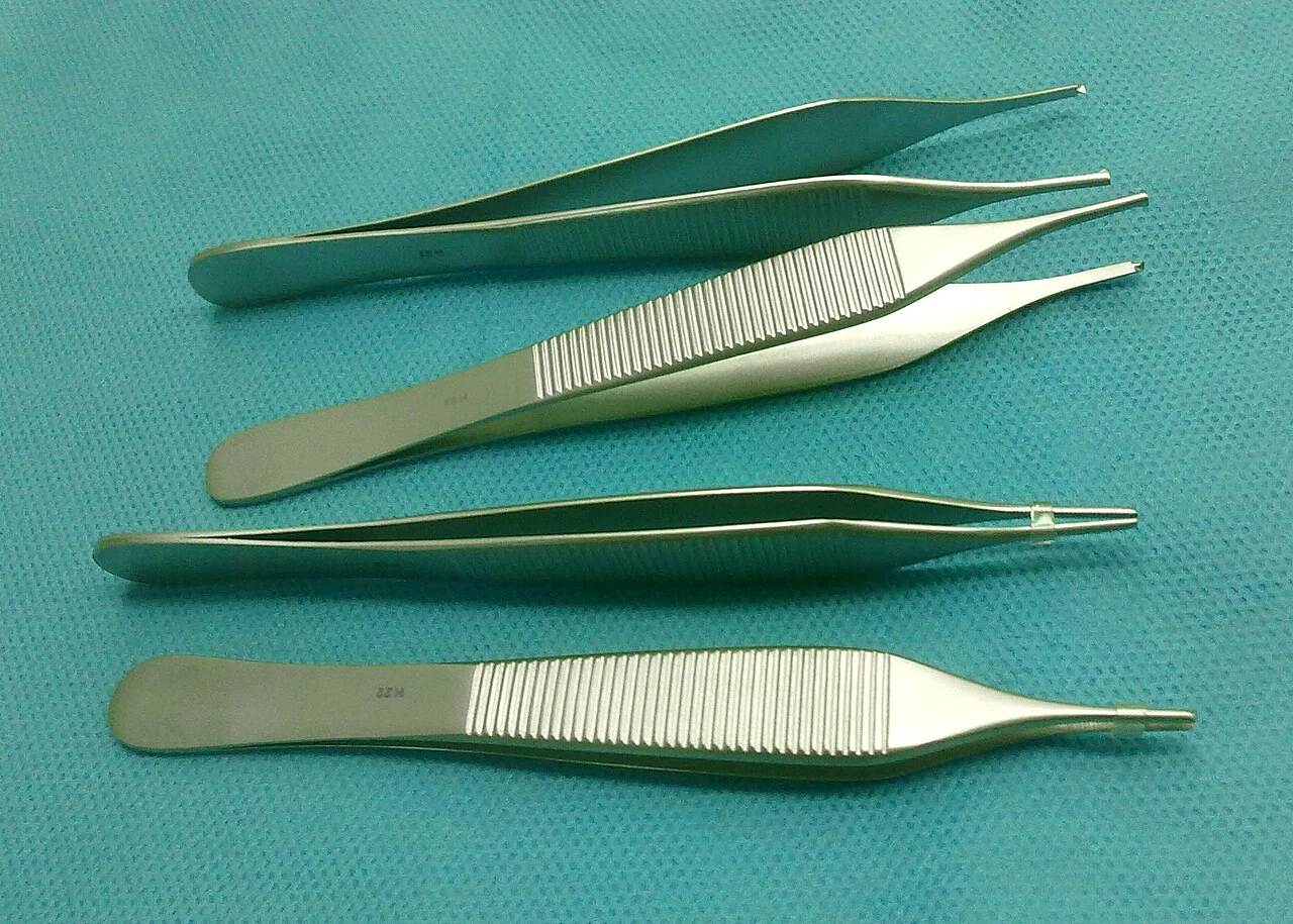 Adson-pattern forceps: compare the toothed and dressing-tip variants.